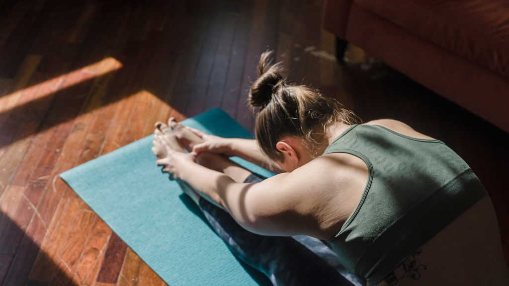 Woman stretching after exercise